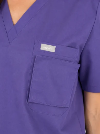 Purple scrub top with V-neck and a large chest pocket featuring a small white label that reads 'efisale'.