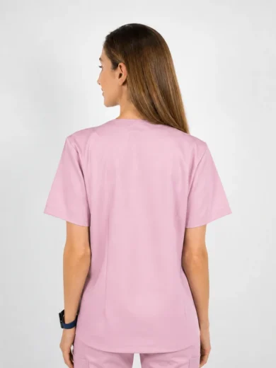 Back view of a person wearing light pink medical scrubs with short sleeves.