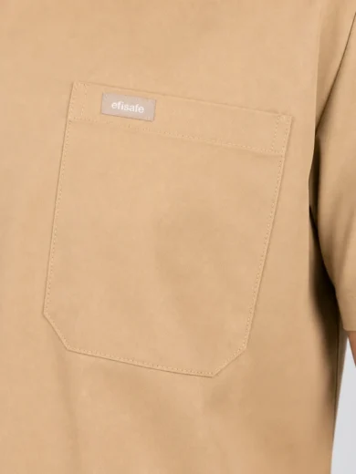 Beige short-sleeve shirt close-up showing a chest pocket with a small gray label that reads 'efisafe'