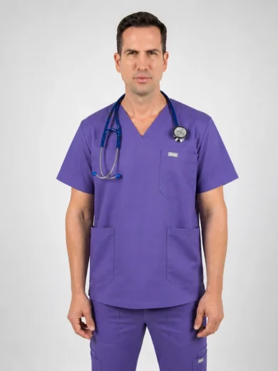 Medical professional in purple scrubs with a stethoscope around the neck, standing facing the camera in a neutral setting.