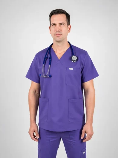 Male healthcare professional wearing purple scrubs with a stethoscope around his neck in a studio setting