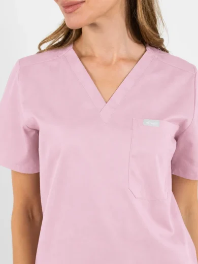 Light pink V-neck scrub top with short sleeves and a left chest pocket.
