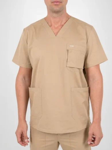 Beige V-neck scrub top with a chest pocket and two lower pockets worn by a person.