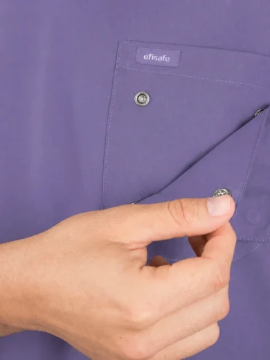 Purple medical scrubs top pocket being opened, showing a snap button and an efisafe label.
