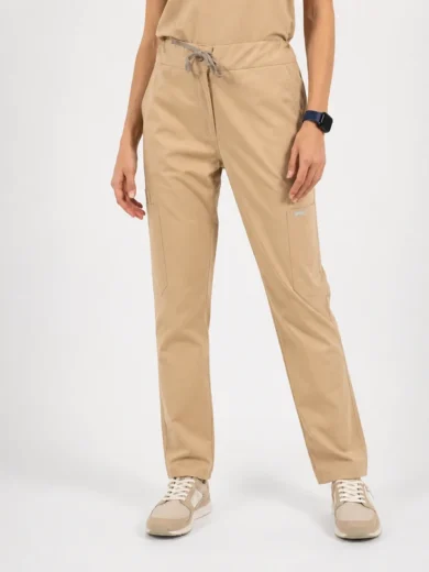 Beige cargo pants with a drawstring waist and side pockets, shown with beige sneakers on a model