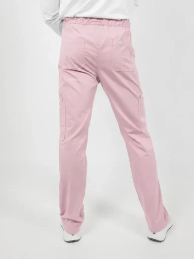 Back view of a person wearing light pink cargo pants with an elastic waistband and white sneakers partially visible at the bottom